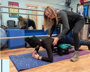 Dr Olson at Asheville Physical Therapy Clinic demonstrating the Schroth Method for Adolescent Scoliosis
